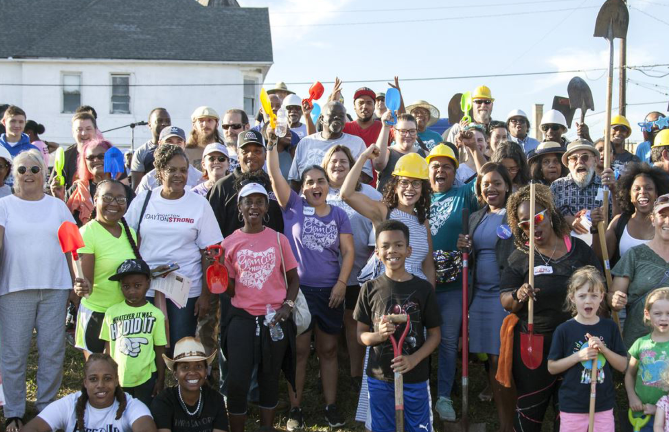 A group of people smiling 