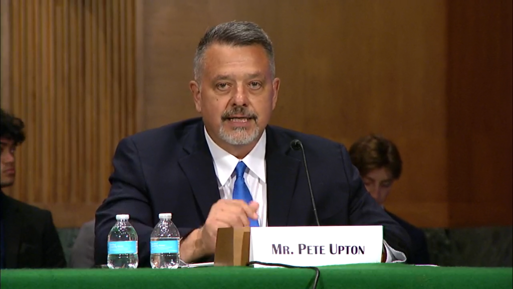 Chris Upton testifying on Capitol hill