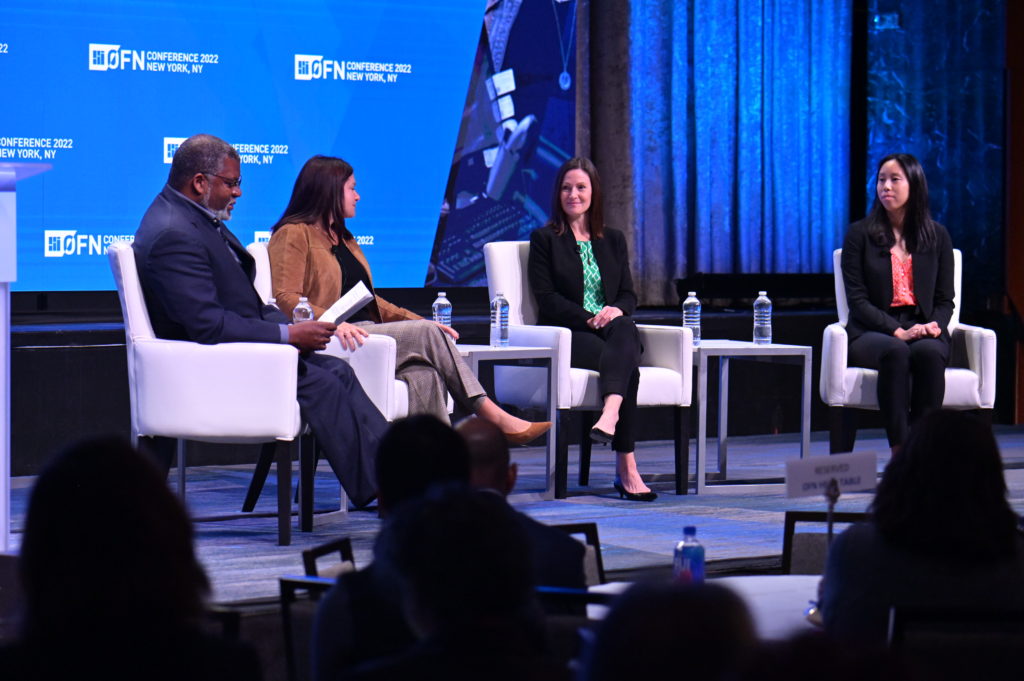 Panel on stage at the OFN conference