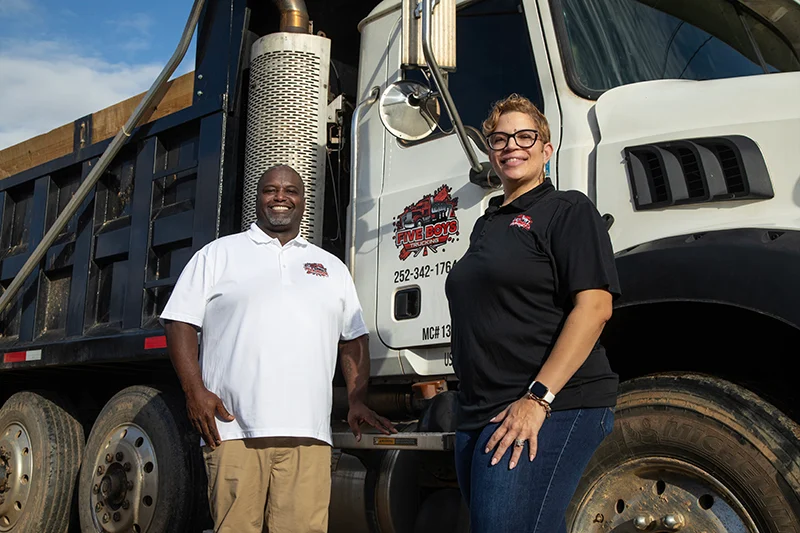 Angelia Raynor, owner of Five Boys Trucking, and her husband, Terrance