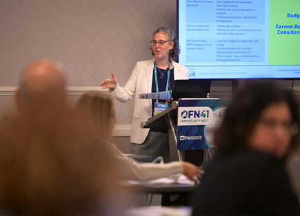 A person giving a presentation at OFN41