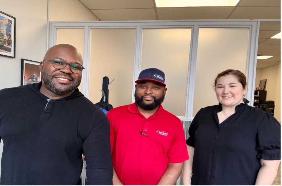 From left to right – Ron Brooks, River City Capital Client Southern Tire Mart, River City Capital Portfolio Manager Amelia Crowley