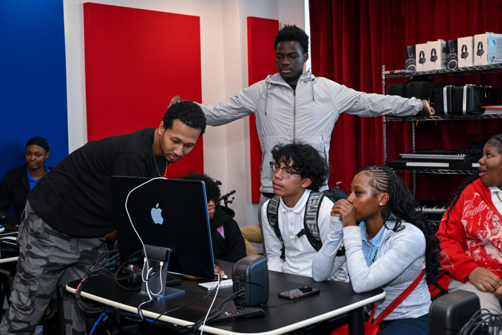 OYC Miami students Tyrone Troy, Zay'Kevia Williams, Andonijah Dorisca, Henry Dubon, Anita Jones with instructor Darrell Shim