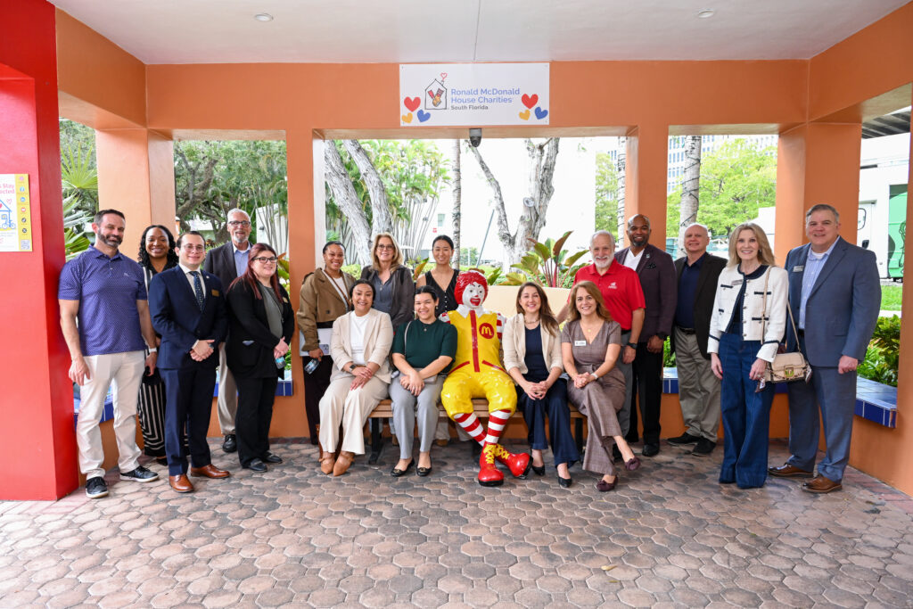 From left to right: Brendon Miller, OFN; Twaquilla Eatman, City of Miami; Daniel Zuniga and Annette Rodriguez, Office of Sen. Moody; Ignacio Esteban, FCLF, Ashley Austin and Dafina Williams, OFN, Maggie Riquelme, Office of Rep. Salazar; Kimberly Colon, Office of Rep. Diaz-Balart; Susie Han, OFN; Sarah Brennan, Self Help; Soraya Rivera-Moya and Alex Rodriguez, RMCH; Harold Pettigrew, OFN; Sam Chesser, Self-Help; Lori Crane and Rich Rollason, FCLF) in front of the current RMCH facility