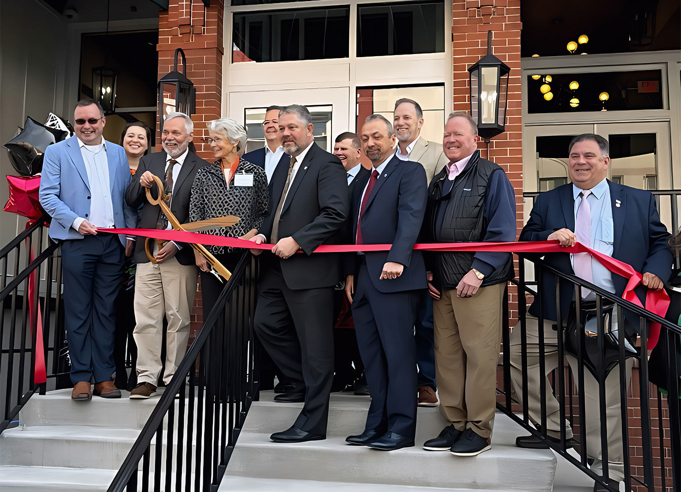 Ribbon cutting ceremony at the reopening of the Tygart Hotel